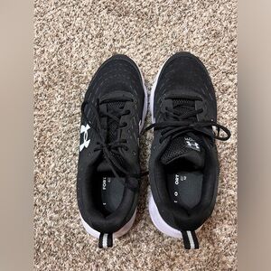 Size 10.5 Men’s UA running shoes.